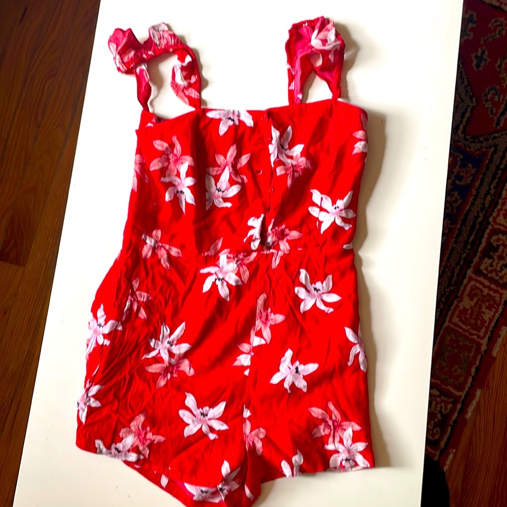 BB Dakota Red romper with floral pattern